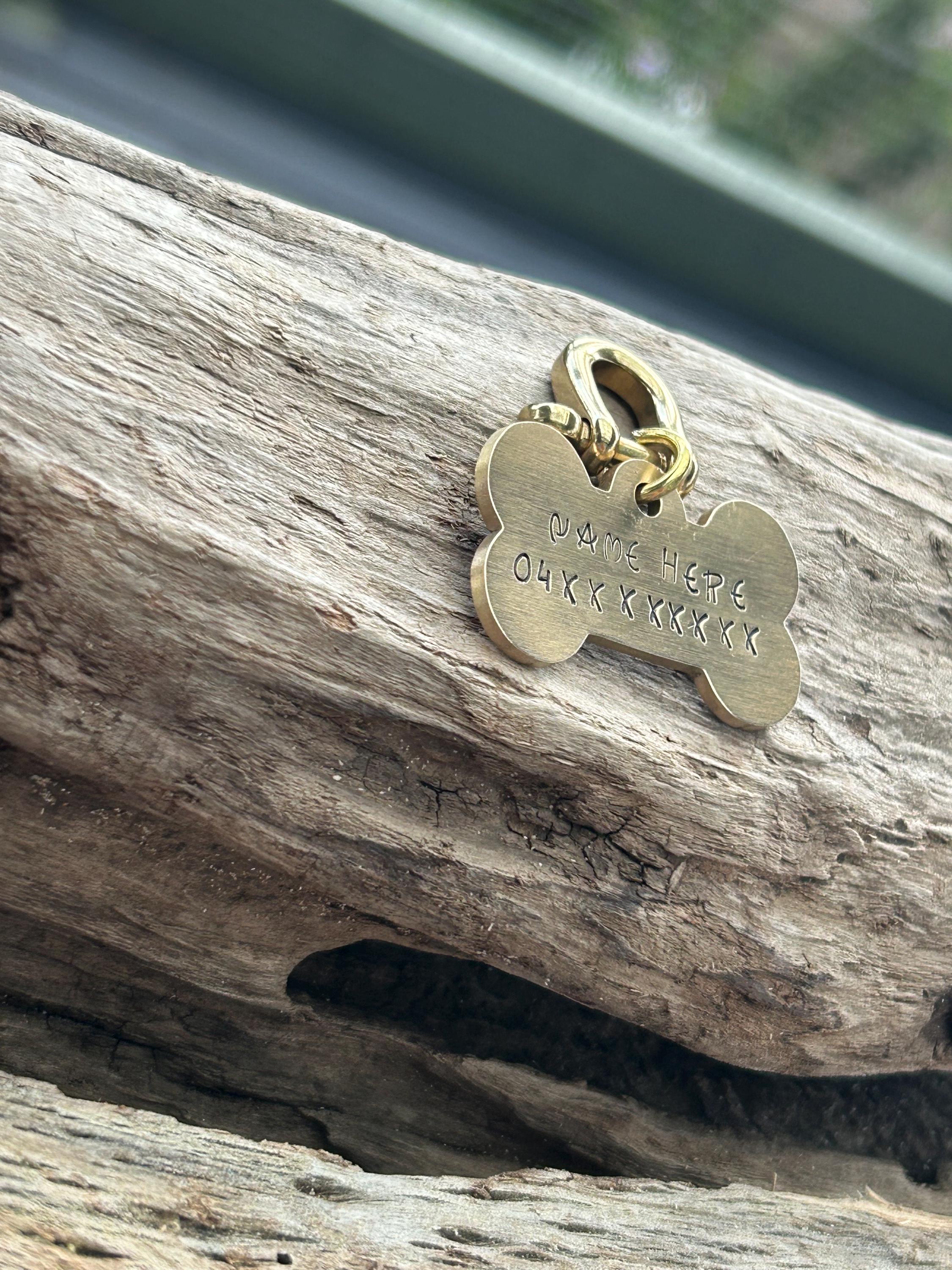 Bone Shaped Brass Dog Tag, Hand Stamped Pet ID with Name and Phone Number, photograph 3