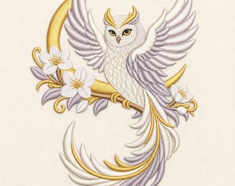 May include: An embroidery design featuring a white owl with spread wings perched on a golden crescent moon. The owl has yellow eyes and tufted ears, surrounded by white flowers with yellow centres and light purple leaves on a cream background.