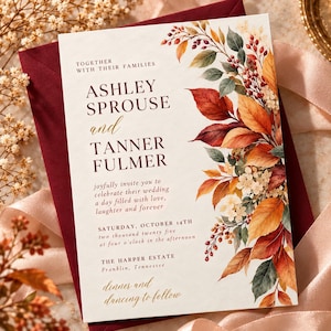 May include: A rectangular wedding invitation card featuring the text Together with their families, Ashley Sprouse and Tanner Fulmer, joyfully invite you to celebrate their wedding, Saturday, October 14th, 2025, at The Harper Estate, Franklin, Tennessee.