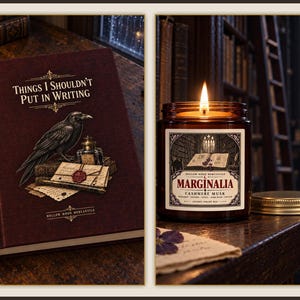Puede incluir: Un libro granate titulado Things I Shouldn't Put in Writing con una ilustración de un cuervo y un tintero, junto a una vela encendida en vaso ámbar etiquetada Marginalia Cashmere Musk con gráfico de biblioteca y tapa de metal dorada.