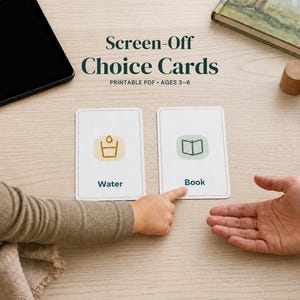 May include: Two white rectangular choice cards labeled Screen-Off Choice Cards, Printable PDF, Ages 3-6. One card features a yellow icon of a glass and the word Water, while the other shows a green icon of an open book and the word Book.