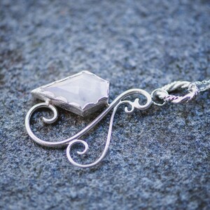 Silver Scrollwork and Rainbow Moonstone Kite Pendant II