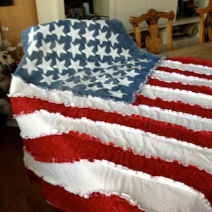 American Flag rag quilt. This gorgeous quilt is made from soft cottons and recycled blue jeans. Filled with all natural cotton batting.