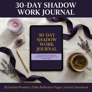 May include: A digital tablet displaying the text 30-DAY SHADOW WORK JOURNAL and a subtitle about honest prompts. The scene includes a purple candle, a gold pen, a cup of tea, dried lavender sprigs, and a dark purple ribbon on a white fabric.