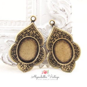 Victorian 10x8mm Oval Antique Brass Ox Oriental Floral Embossed Earring Drops 10x8mm Oval Settings, Cab Flat Back Bezel Charm Settings – 4