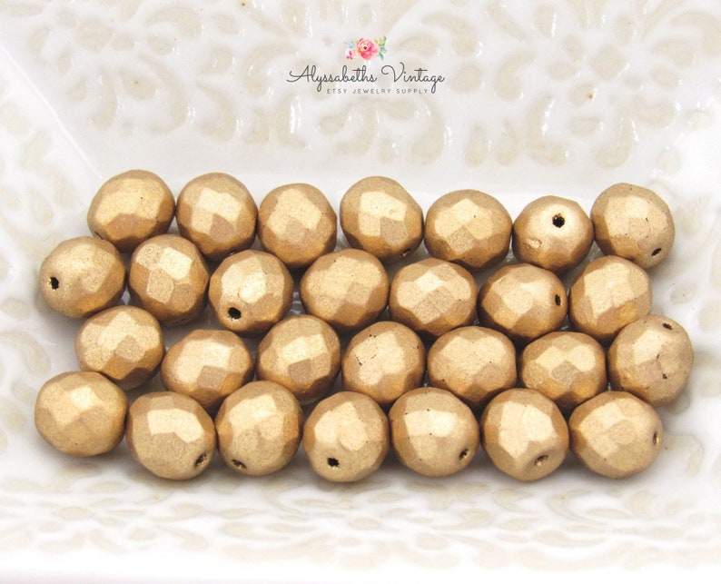 pack of 20 Czech glass pressed beads faceted yellow