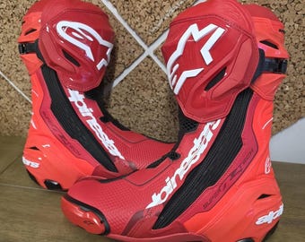 Alpinestars Abbigliamento da moto sportivo rosso Supertech, stivali da pista