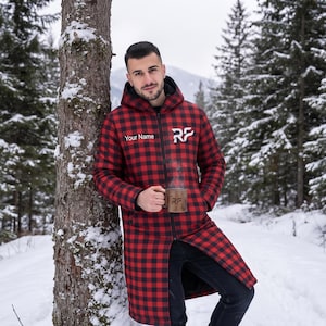 May include: A long-length hooded jacket featuring a red and black buffalo plaid pattern, a full-length front zipper, and long sleeves. The chest area displays the text Your Name and a white logo with the letters RF. The interior is lined in black.