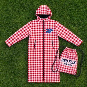 May include: A long-sleeved hooded robe featuring a red and white gingham check pattern, a full-length black front zipper, and a blue RF logo on the chest. Accompanied by a matching drawstring backpack with the text RED FLIX Industry printed on it.