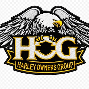 May include: An embroidered patch featuring a bald eagle with spread wings perched above the letters HOG in white with yellow outlines. Below, a yellow banner contains the black text HARLEY OWNERS GROUP, all set against a black background.