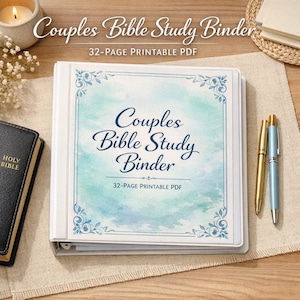 May include: A white three-ring binder featuring a light blue watercolor background with dark blue text that reads Couples Bible Study Binder and 32-PAGE PRINTABLE PDF, framed by decorative blue floral corners on the front cover.