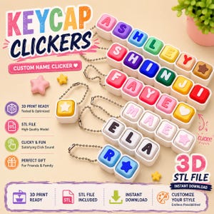 May include: A collection of 3D printed keycap clickers featuring colorful square blocks with letters and symbols. Each clicker is attached to a metal ball chain. The blocks display names like ASHLEY, SHINJI, FAYE, MAE, ELA, and R, with star and heart icons.
