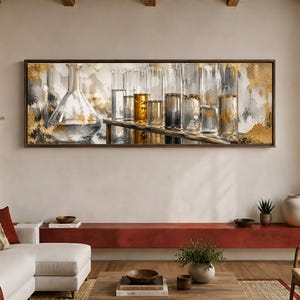 May include: A panoramic wall art piece featuring a laboratory scene with a large glass flask and a row of test tubes filled with various liquids. The composition is accented with textured gold leaf and grey paint strokes on a neutral background.