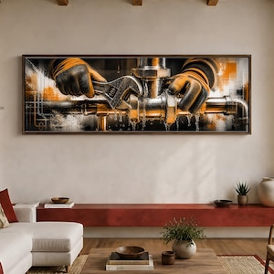 May include: A panoramic wall art print featuring a close-up of two hands wearing yellow and black work gloves, using a silver adjustable wrench to tighten a metallic pipe fitting. The scene includes dripping water and a dark, industrial background.