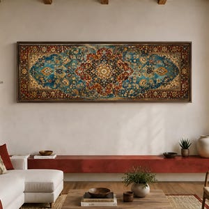 May include: A long, rectangular wall art piece featuring a detailed, intricate floral mandala pattern in shades of deep red, navy blue, and gold. The artwork is enclosed in a dark wooden frame and displays a symmetrical, ornate design.