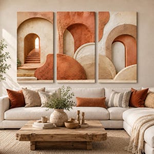 May include: A triptych wall art set featuring three vertical panels with abstract architectural designs. The artwork displays terracotta, beige, and cream-colored arches, circular forms, and a staircase, rendered with a textured, layered appearance.