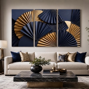 May include: A triptych wall art set featuring a layered design of navy blue and metallic gold pleated fan shapes. The three rectangular panels display a repeating pattern of circular, folded paper-like fans arranged in an overlapping composition.