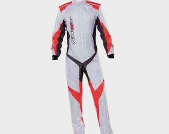 May include: A light grey racing suit featuring red and black colour-blocked panels on the sleeves and legs. The garment has a high collar, a central zip closure, and the text KS-ART printed vertically in white on the chest area.