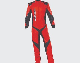 May include: A red and black racing suit featuring long sleeves, a high collar, and black paneling along the sides, shoulders, and legs. The text KS-ART is printed vertically in white on the right side of the chest area of this full-body garment.
