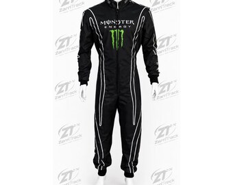May include: A black racing suit featuring the Monster Energy logo in green and white on the chest. The suit has a high collar, a full-length front zip, long sleeves with black cuffs, and white piping accents running vertically down the torso and legs.