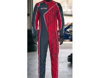 May include: A full-body racing suit featuring a split colour design of dark grey and red. The suit displays the text NITRO in white on the chest and in large black lettering down the right leg. It includes long sleeves, a high collar, and piping.