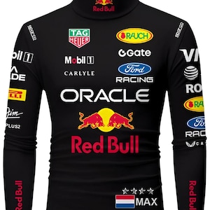 May include: A black long-sleeve mock neck shirt featuring various sponsor logos including Oracle, Red Bull, Mobil 1, TAG Heuer, Ford Racing, and Rauch. The chest displays the Red Bull logo, while the lower front includes four stars and a Dutch flag with the text MAX.