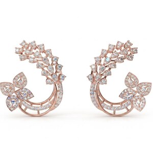 May include: A pair of rose gold earrings featuring a curved, open-hoop design adorned with numerous small, clear, round-cut diamonds. The earrings display a cluster of pear-shaped diamond accents at the base and a curved, leaf-like diamond spray.
