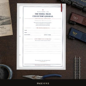 May include: A white paper page titled The Model Train Collector's Journal with dark blue and red text. It includes fields for name, email, date started, journal number, and a section for notes, with a red ribbon bookmark on the right edge.