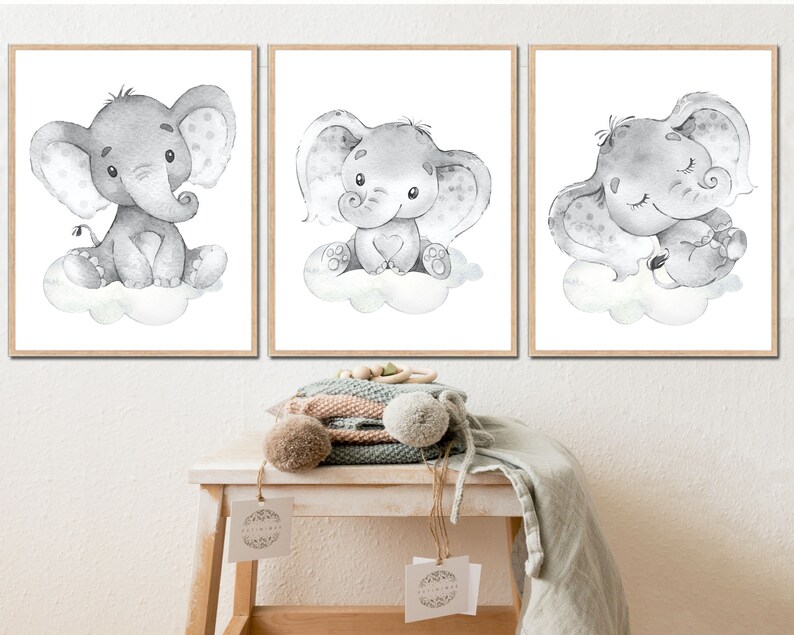 May include: Three black and white watercolor illustrations of elephants on clouds. Each elephant has a different expression. The first elephant is sitting up, the second elephant is looking up, and the third elephant is sleeping.