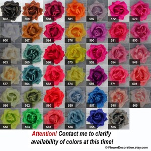 May include: A chart of 36 different colored paper roses, each with a number label. The roses are arranged in a grid of six rows and six columns. The colors include red, pink, orange, yellow, green, blue, purple, and white.