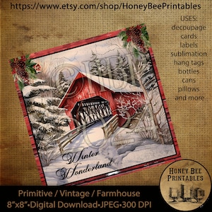 Op de afbeelding: Een digitaal printbaar beeld van een rode overdekte brug in een winterwonderland-setting. De brug is bedekt met sneeuw en de bomen zijn kaal. De tekst "Winter Wonderland" is in cursief geschreven onderaan de afbeelding. De afbeelding is 8 inch bij 8 inch en heeft een resolutie van 300 DPI.