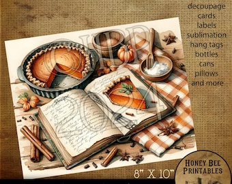 Può includere: Una stampa digitale con un'illustrazione ad acquerello di una torta di zucca, un libro di ricette e spezie. La stampa misura 20,3 cm x 25,4 cm e include la parola "Recipe". Tema vintage e rustico.