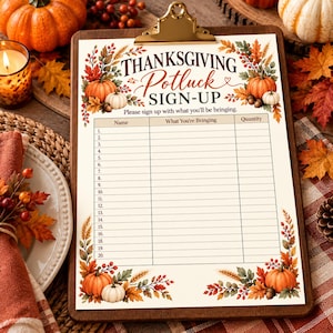May include: A Thanksgiving potluck sign-up sheet on a wooden clipboard with a gold metal clip. The paper features autumn-themed illustrations of pumpkins, wheat, and fall leaves, with columns for Name, What You're Bringing, and Quantity for 20 entries.