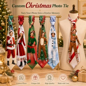 May include: A collection of six neckties hanging on a gold display rack, each featuring a custom photo of a person dressed in various holiday costumes including Santa, an elf, a reindeer, a snowman, and a gingerbread person with festive patterns.