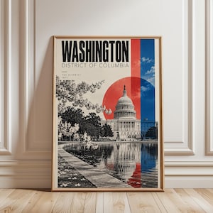 Peut inclure: Une affiche encadrée représentant le Capitole des États-Unis à Washington, D.C. L'impression affiche le texte WASHINGTON DISTRICT OF COLUMBIA THE DISTRICT 1871, des fleurs de cerisier, un grand cercle rouge et une bande verticale bleue.