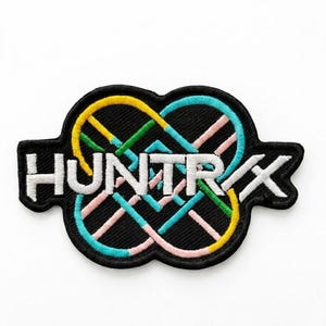 May include: A black embroidered patch featuring the white text HUNTRX centered over an interlocking infinity-style knot design. The knot is composed of vibrant yellow, light blue, green, and soft pink thread lines against a black background.