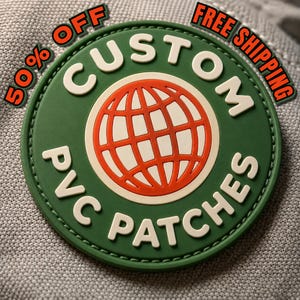 May include: A circular green PVC patch featuring a central orange globe icon with white grid lines. The text CUSTOM PVC PATCHES is embossed in white lettering around the globe. The image includes the text 50% OFF and FREE SHIPPING.