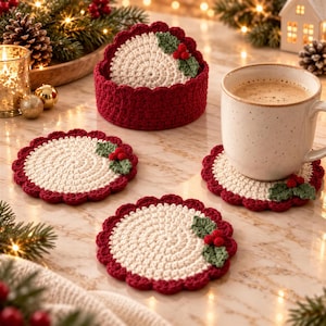 May include: A set of round, crocheted coasters featuring a cream-colored center, a deep red scalloped border, and a small green holly leaf and red berry applique. The set includes a matching circular holder for storing the coasters.