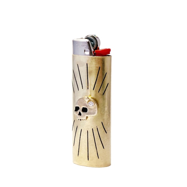 Estuche para encendedor con forma de calavera