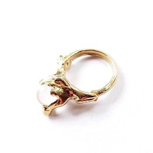 Kleine ring met gesmolten messing kristallen bol