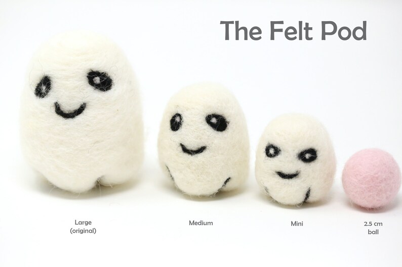May include: The Felt Pod is a set of three white felt ghost ornaments with black embroidered faces. The ghosts are in three sizes: large, medium, and mini. A 2.5 inch pink felt ball is also included.