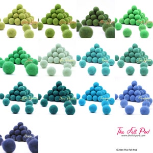 May include: Assortment of 20mm felt balls in various shades of green, blue, and teal. The felt balls are arranged in groups of 15, with three individual balls below each group. The felt balls are displayed on a white background.