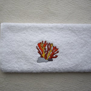 Guest towel embroidered with a coral image 1