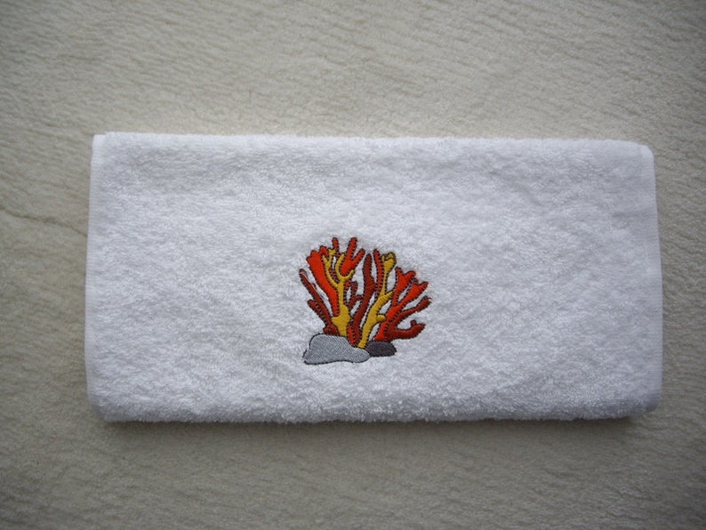 Guest towel embroidered with a coral image 1