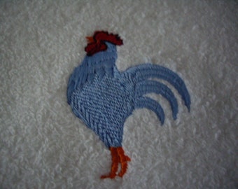 Towel guests embroidered with a rooster