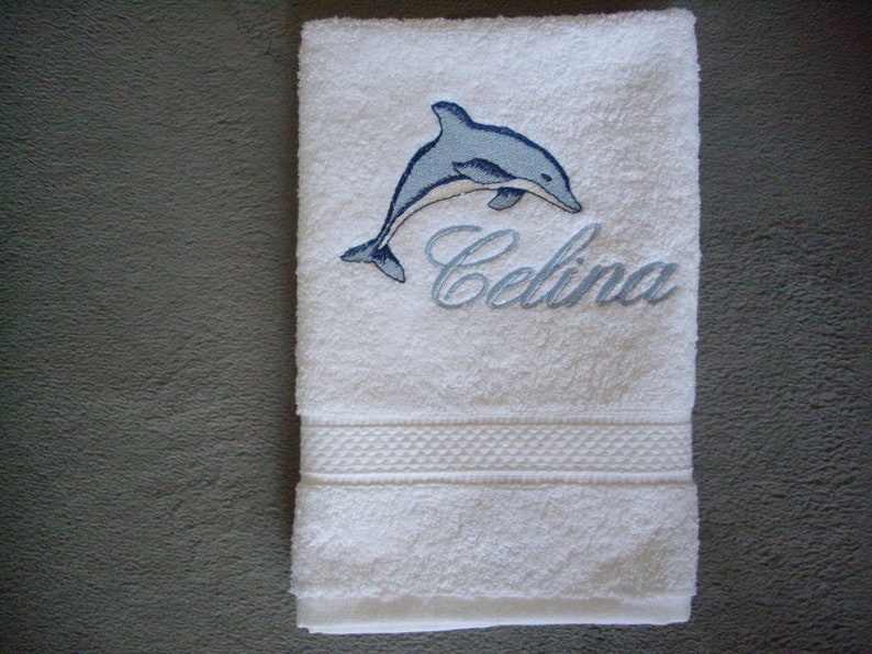 Towel embroidered with name and dolphin image 1