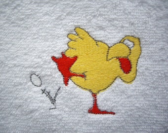 Handtuch-Frottee-Gästehandtuch-weiß bestickt mit einer gelben Henne , die ein Bein hebt und ein Ei legt