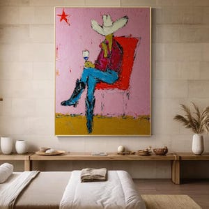 May include: A textured oil painting on canvas depicting a figure in a white cowboy hat, red shirt, and blue jeans sitting on a red chair. The figure holds a wine glass against a pink background with a red star and a gold floor section.
