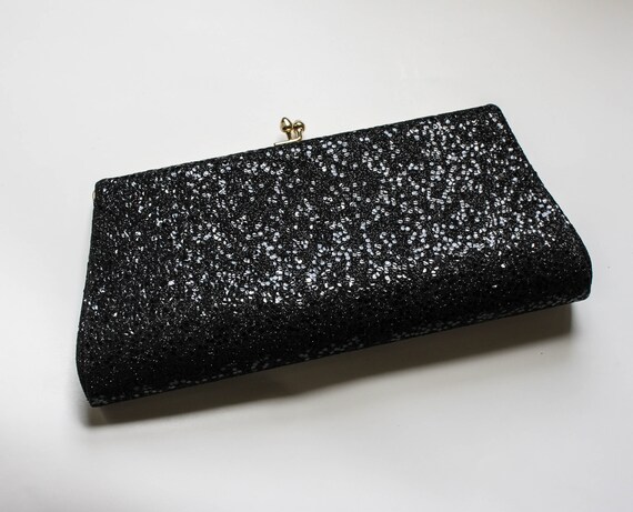 black sparkly clutch