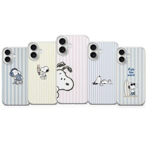 May include: Five smartphone cases featuring Snoopy illustrations on pastel striped backgrounds. The designs include Snoopy with headphones, holding an ice cream cone, a large close-up face, lying down, and standing with a surfboard with the text Ride the wave.